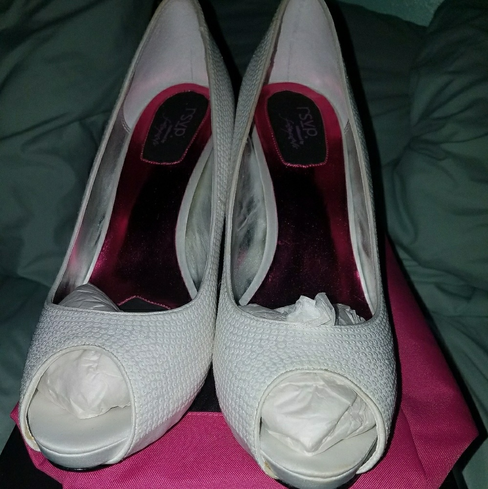 New heels in box with dust bag